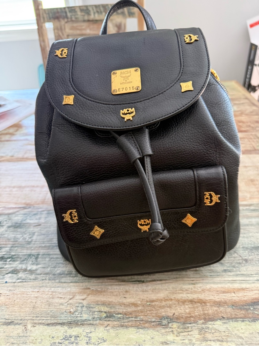 MCM Black Leather Backpack with Gold Hardware